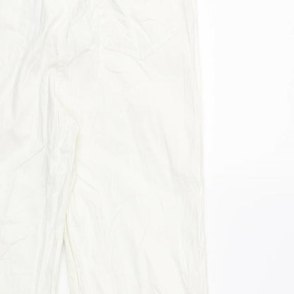Brand and care label for Bogner women’s white trousers, size UK 32, in, 25-inch leg