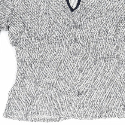 Brand and care label for Zara women’s silver knit jumper, size XS