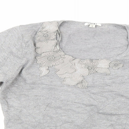 Close-up detail of text women’s grey jumper, size S