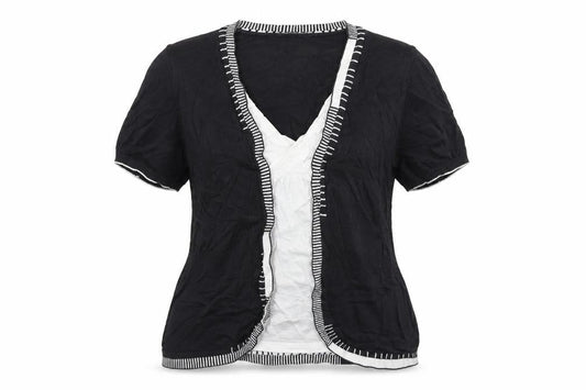 Front view of Per Una women’s black geometric jumper, size UK 16