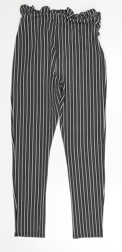 Back view of PRETTYLITTLETHING women’s black striped trousers, size UK 10, 27-inch leg