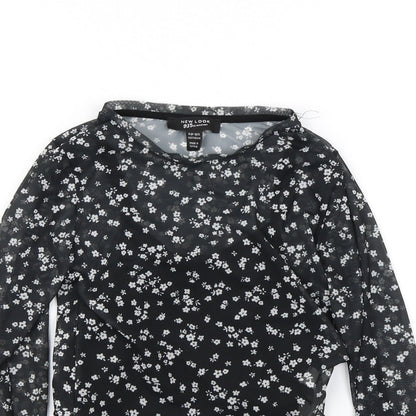 Close-up detail of New Look girls’ black polka dot basic blouse, size 10, years