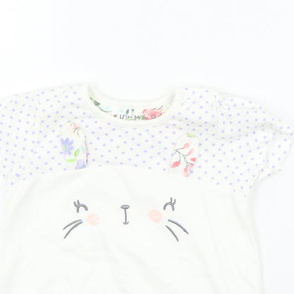 Close-up detail of Nutmeg girls’ white polka dot basic t-shirt, size 6-9, months - rabbit