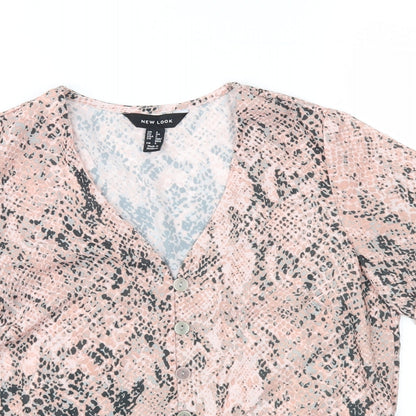 Close-up detail of New Look women’s pink animal print basic blouse, size UK 6