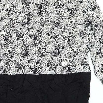 Brand and care label for Next women’s black floral jumper, size UK 6