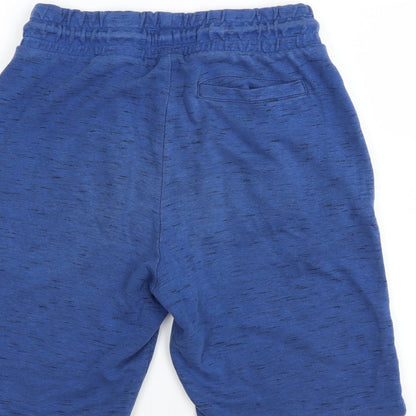 Brand and care label for F&F boys’ blue sweat shorts, size S