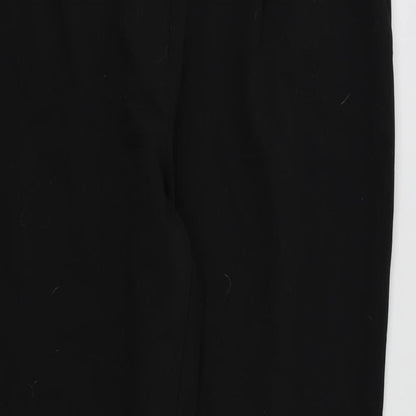 Close-up detail of Preworn women’s black trousers, size UK 16, 26-inch leg