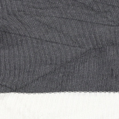 Brand and care label for Gap women’s grey jumper, size XS