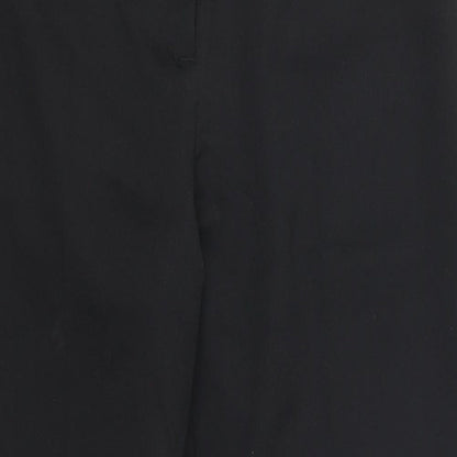 Close-up detail of Preworn women’s black trousers, size UK 30, in, 24-inch leg