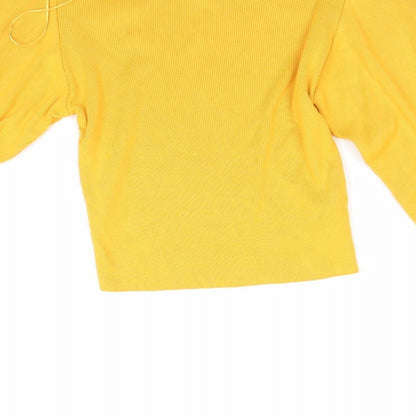 Brand and care label for Topshop women’s orange corduroy jumper, size UK 8