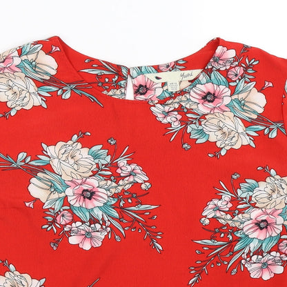 Close-up detail of Yumi women’s red floral basic blouse, size UK 14