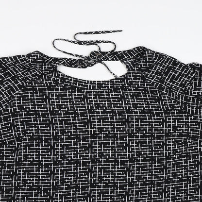 Close-up detail of Nutmeg women’s black check chiffon basic blouse, size UK 14