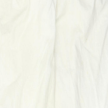 Brand and care label for Vintage Casuals women’s beige trousers, size UK 14, 31-inch leg
