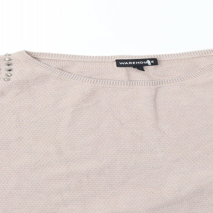 Close-up detail of Warehouse women’s pink jumper, size M, - studs on sholder