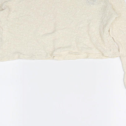 Brand and care label for Forever 21 women’s beige jumper, size S