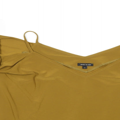 Close-up detail of River Island women’s gold basic blouse, size UK 10