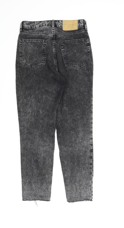 Back view of Divided women’s black denim tapered jeans, size UK 8, 25-inch leg