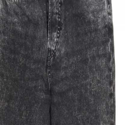 Close-up detail of Divided women’s black denim tapered jeans, size UK 8, 25-inch leg