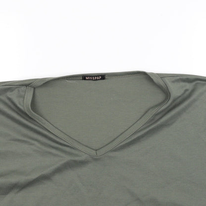 Close-up detail of Misspap women’s green basic tank, size M
