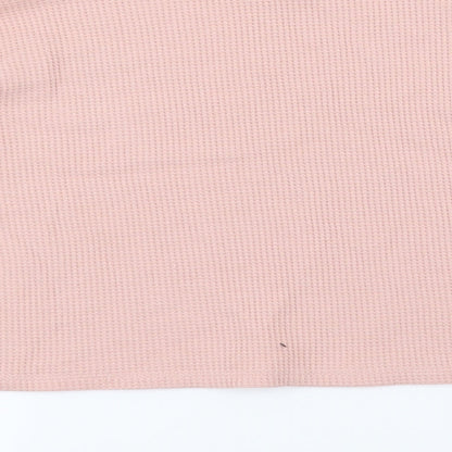 Brand and care label for Forever 21 women’s pink jumper, size M