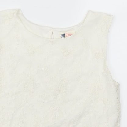Close-up detail of H&M girls’ white lace basic tank, size 14, years