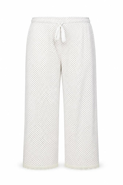 Front view of Secret Obsessions women’s ivory polka dot trousers, size L, 22-inch leg