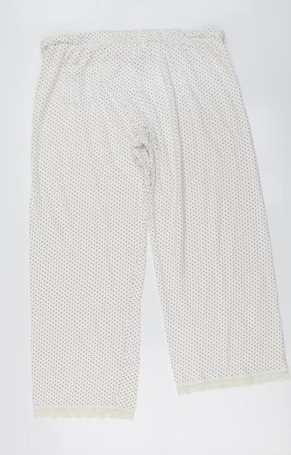 Back view of Secret Obsessions women’s ivory polka dot trousers, size L, 22-inch leg