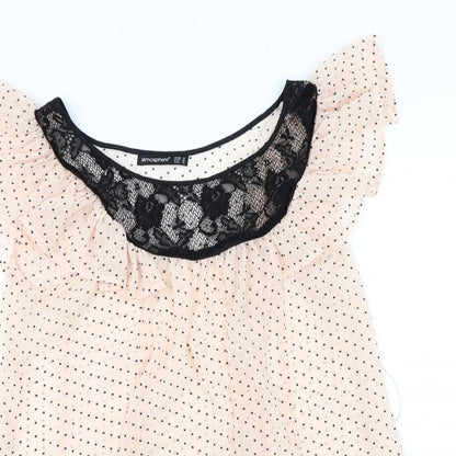 Close-up detail of Atmosphere women’s pink polka dot basic blouse, size UK 10