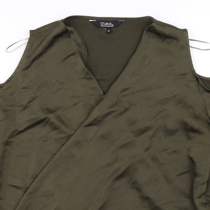 Close-up detail of Star women’s brown basic blouse, size UK 12