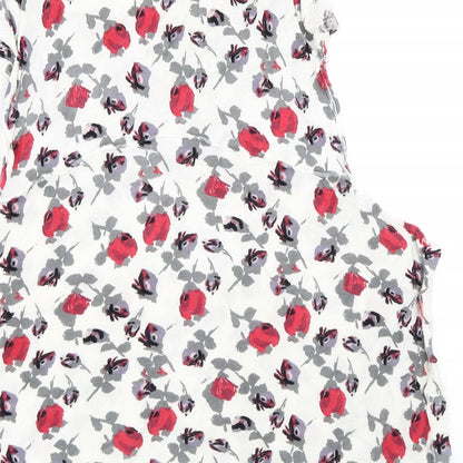 Brand and care label for Karen Cole women’s white floral jumper, size S
