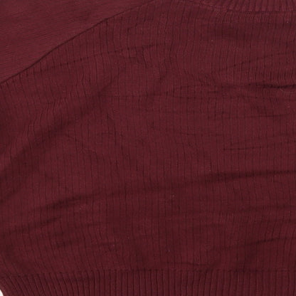 Brand and care label for Mango women’s red jumper, size UK 4