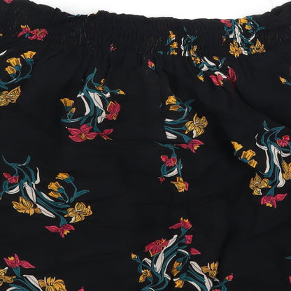 Brand and care label for River Island women’s black floral basic blouse, size UK 6