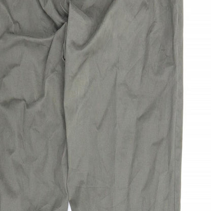 Brand and care label for Up Fashion women’s green carpenter trousers, size UK 16, 29-inch leg