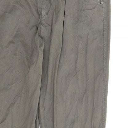 Close-up detail of Preworn women’s green pedal pusher trousers, size M, 25-inch leg