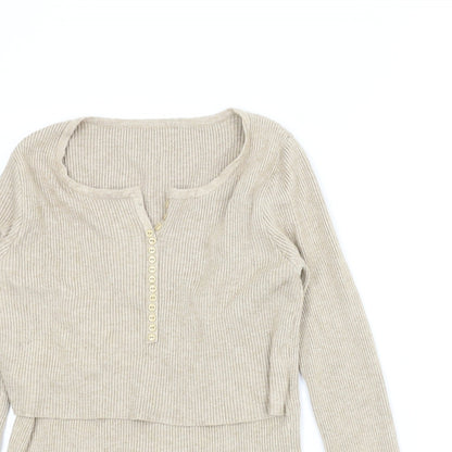 Close-up detail of Preworn women’s beige jumper, size XS