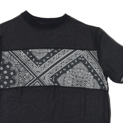 Close-up detail of Preworn women’s black argyle/diamond basic t-shirt, size XS