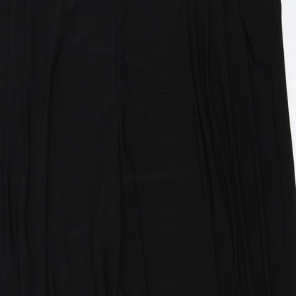 Close-up detail of styled by women’s black trousers, size UK 38, in, 23-inch leg