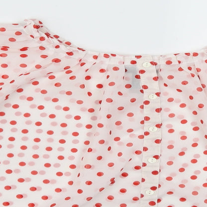 Close-up detail of H&M women’s red polka dot basic button-up, size UK 6