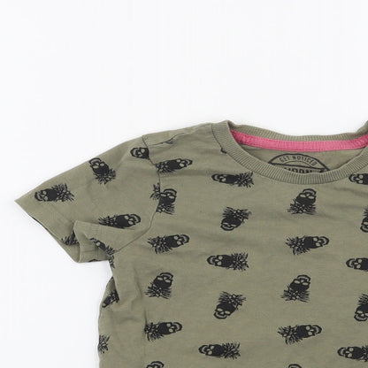 Close-up detail of Matalan boys’ green basic t-shirt, size 5, years - skulls