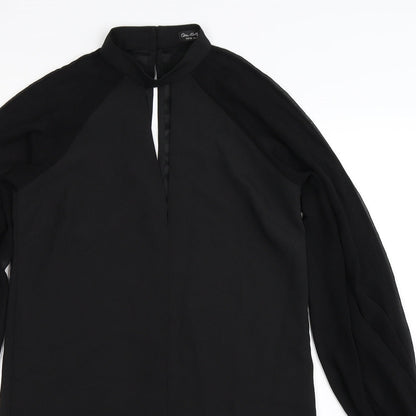 Close-up detail of Miss Selfridge women’s black mini, size UK 10