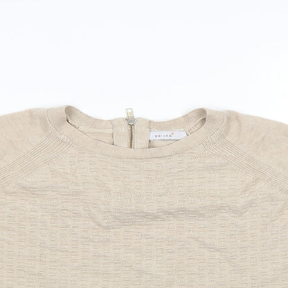 Close-up detail of Per Una women’s ivory jumper, size UK 12