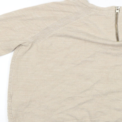 Brand and care label for Per Una women’s ivory jumper, size UK 12