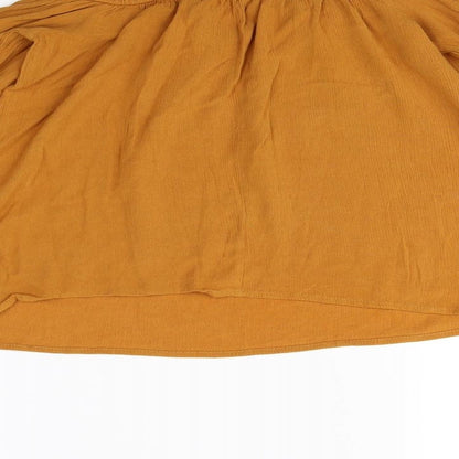 Brand and care label for Primark women’s brown basic blouse, size UK 6