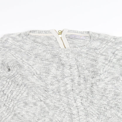 Close-up detail of Per Una women’s white jumper, size UK 16