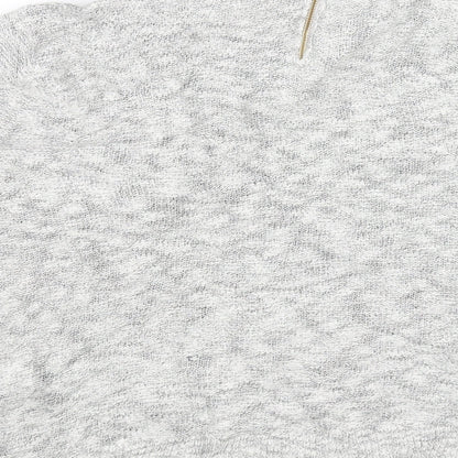 Brand and care label for Per Una women’s white jumper, size UK 16