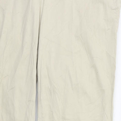 Close-up detail of Flame women’s beige trousers, size UK 16, 28-inch leg