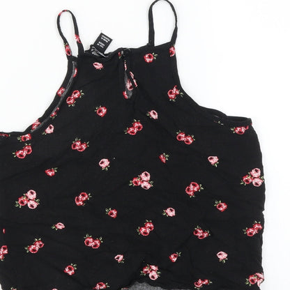 Brand and care label for New Look girls’ black floral basic blouse, size 10, years