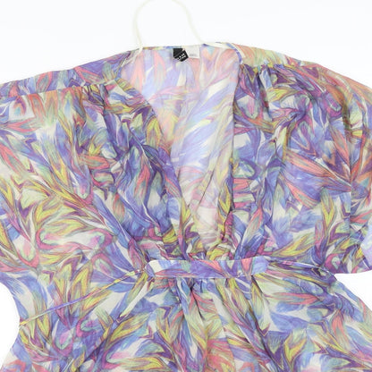 Close-up detail of Divided by H&M women’s multicoloured floral chiffon basic blouse, size UK 10, - kaftan