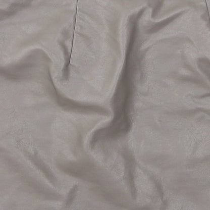 Brand and care label for Primark women’s brown a-line skirt, size UK 8