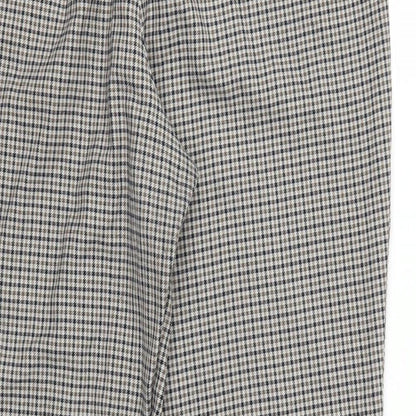 Brand and care label for H&M women’s brown check trousers, size UK 16, 25-inch leg